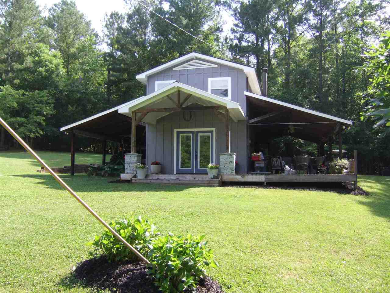 8815 Northcutt Road Fairburn, GA 30213 - Photo 1 of 1 a view of a house with pool yard and balcony