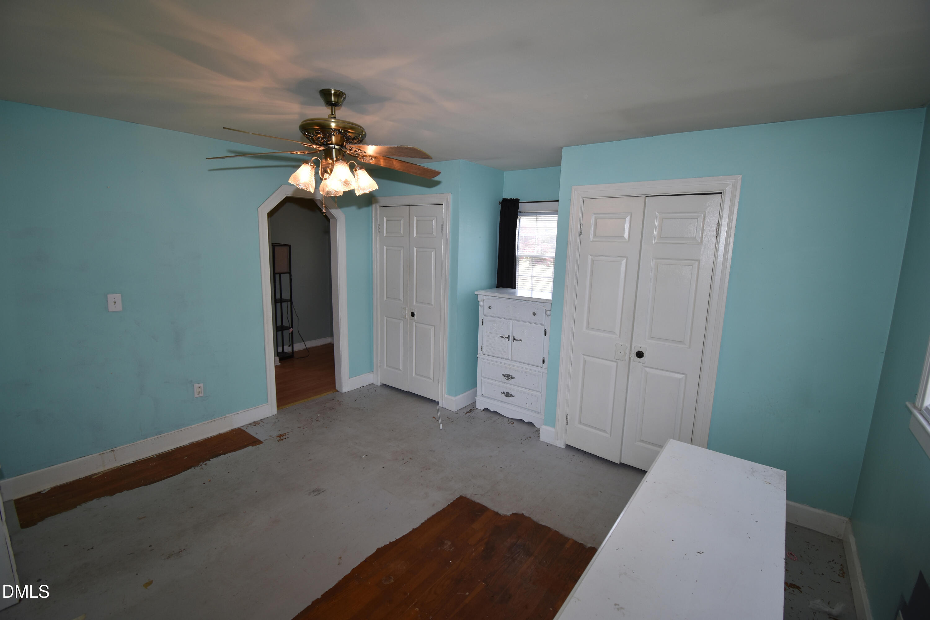 5868 Massey Road Zebulon, NC 27597 - Photo 12 of 24 a view of a chandelier fan and entryway