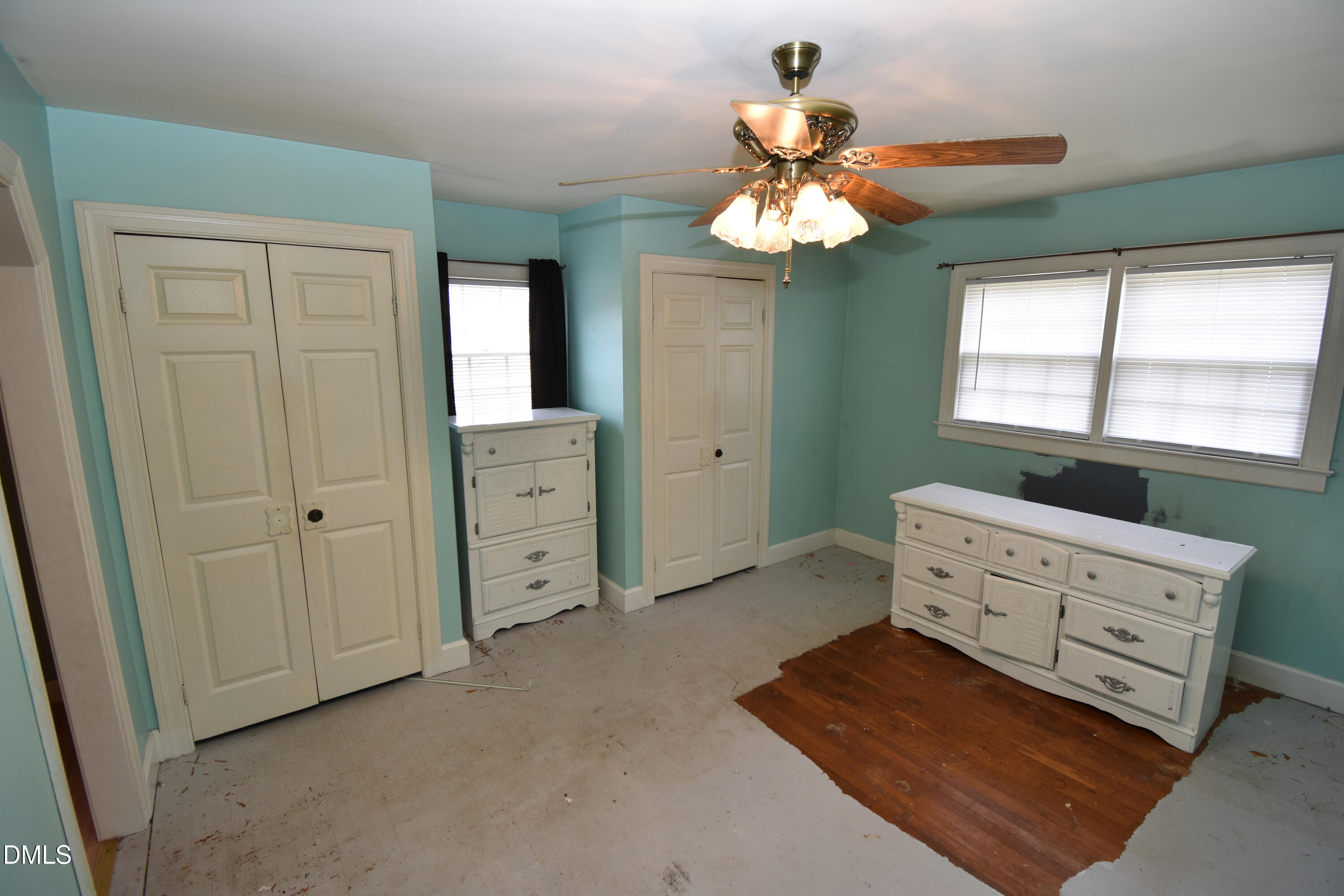 5868 Massey Road Zebulon, NC 27597 - Photo 13 of 24 wooden floor with chandelier and window