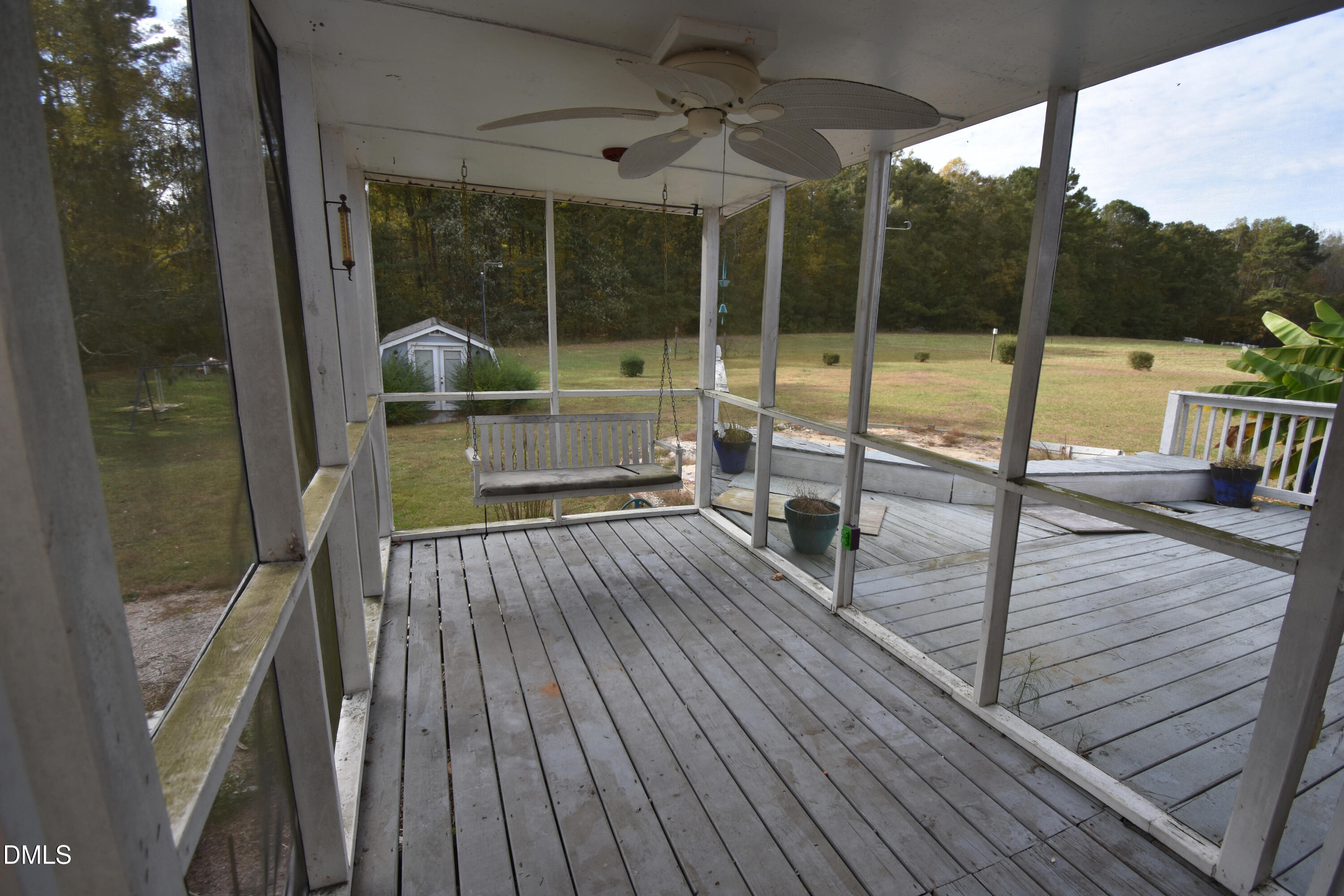 5868 Massey Road Zebulon, NC 27597 - Photo 22 of 24 a view of a balcony with wooden floor