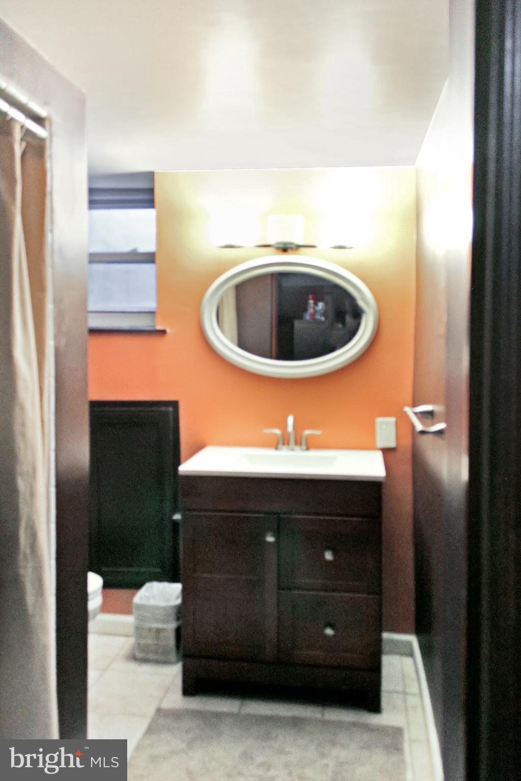 1535 Ralworth Road Baltimore, MD 21218 - Photo 17 of 18 Beautiful fully finished bath in the basement.