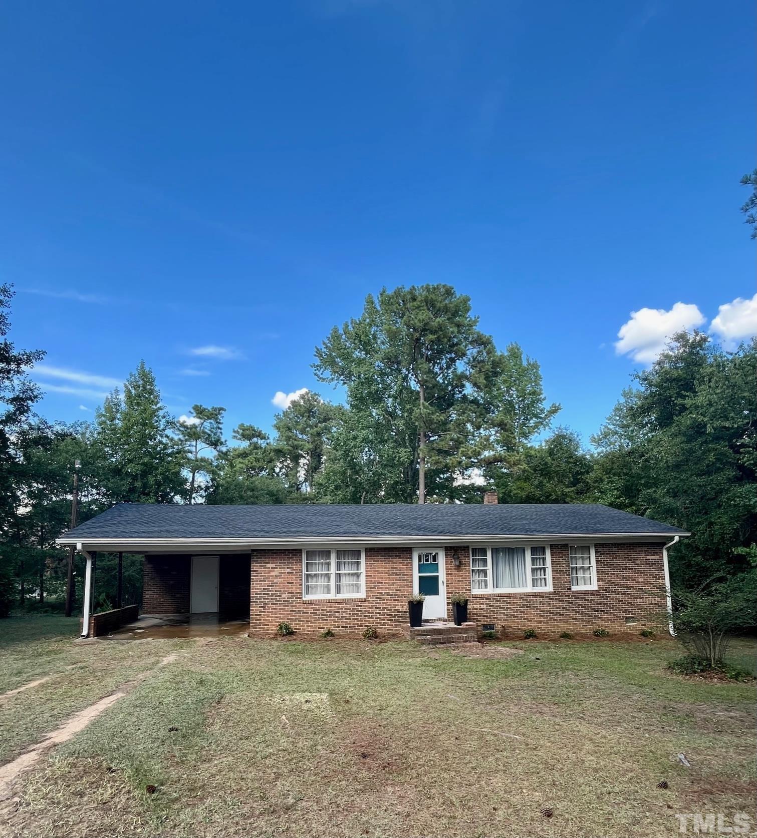 2342 Mitchell Road Angier, NC 27501 - Photo 1 of 10 front view of house with a yard