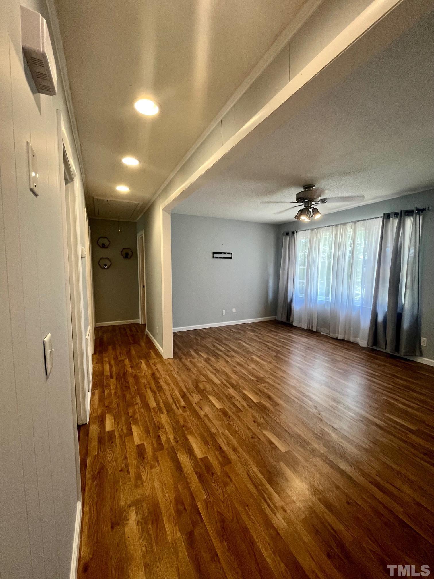 2342 Mitchell Road Angier, NC 27501 - Photo 7 of 10 a view of entryway with wooden floor