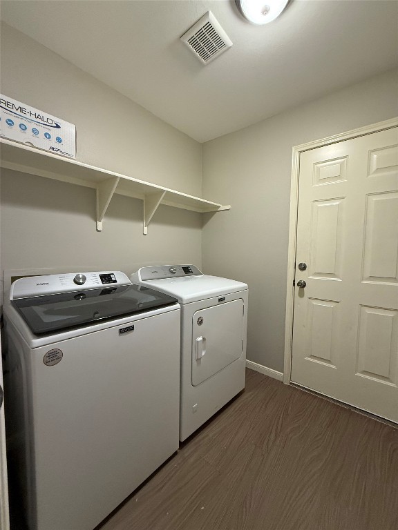 5412 Mesquite Grove Road Austin, TX 78744 - Photo 15 of 15 a utility room with dryer and washer