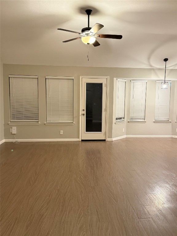 5412 Mesquite Grove Road Austin, TX 78744 - Photo 3 of 15 a view of an empty room with a window