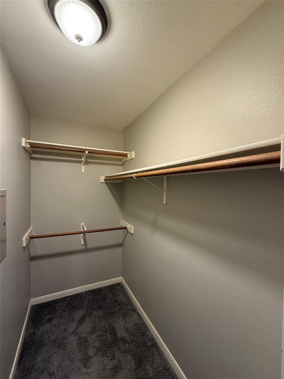 5412 Mesquite Grove Road Austin, TX 78744 - Photo 10 of 15 an empty room with a wooden floor and a window