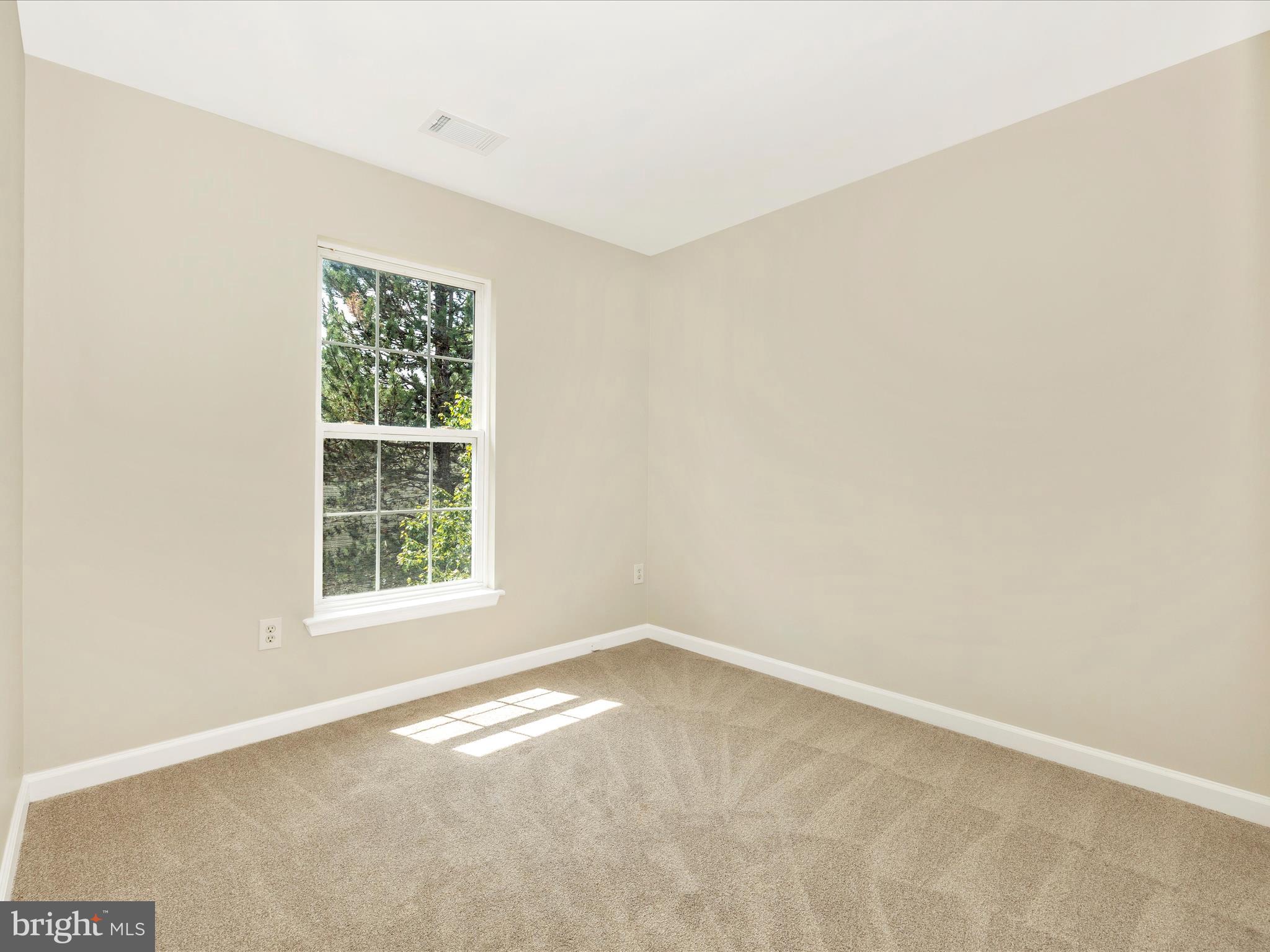 5534 Upshur Square Frederick, MD 21703 - Photo 26 of 46 an empty room with a window