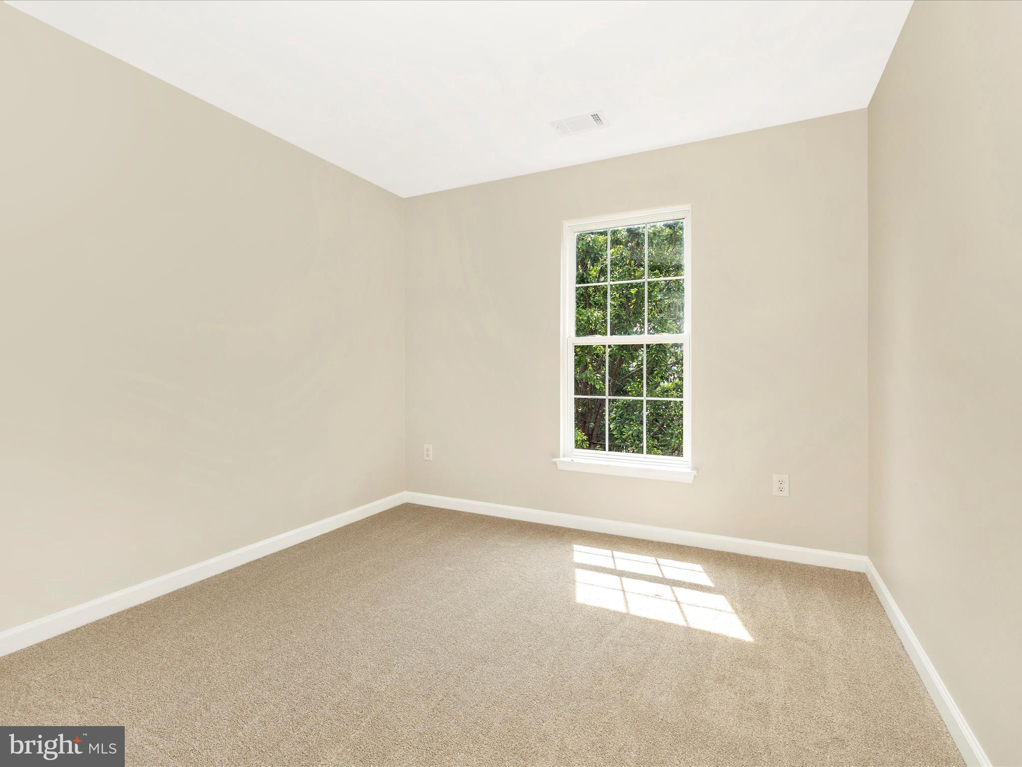 5534 Upshur Square Frederick, MD 21703 - Photo 28 of 46 an empty room with a window