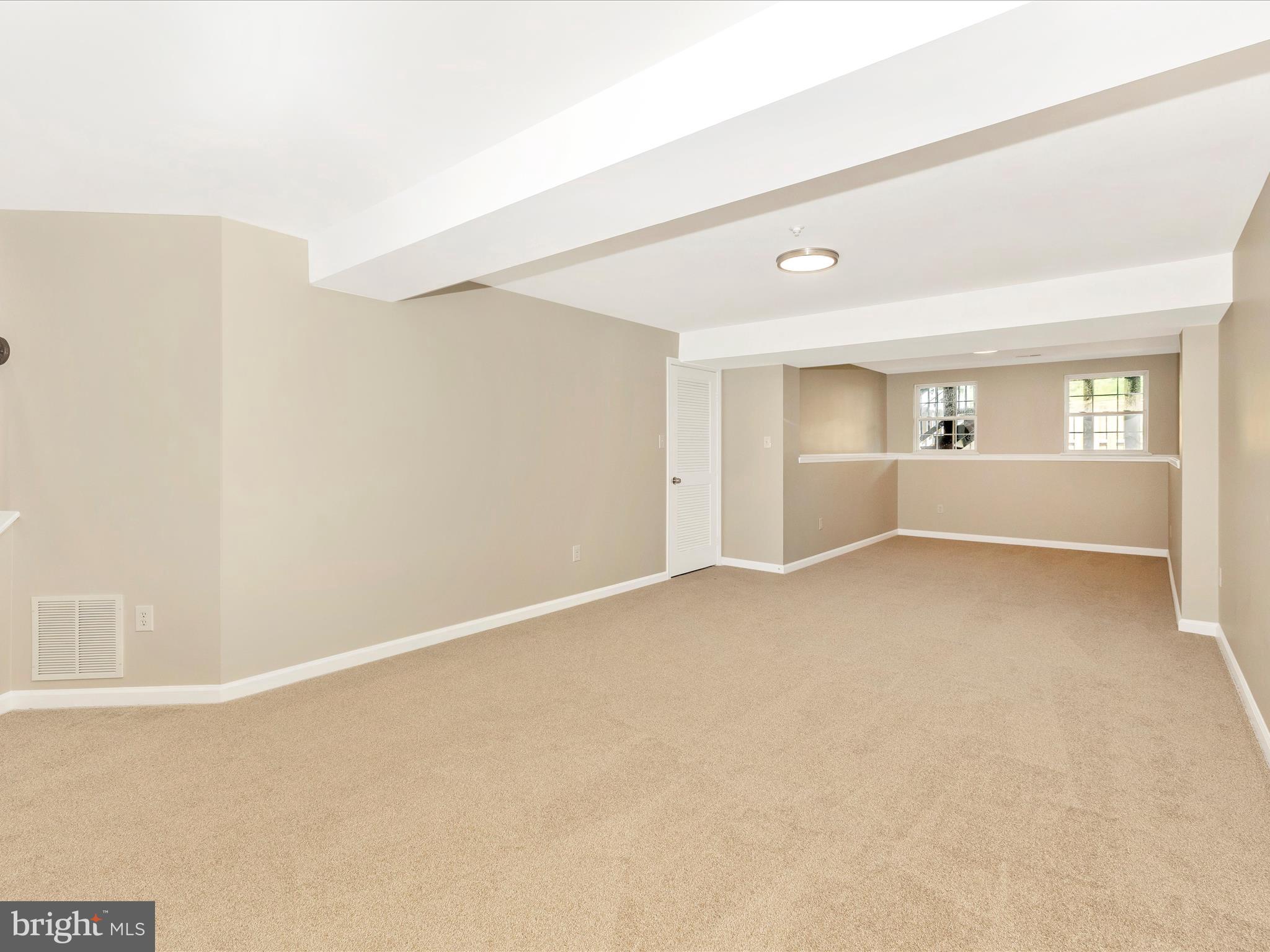 5534 Upshur Square Frederick, MD 21703 - Photo 31 of 46 a view of an empty room with a window