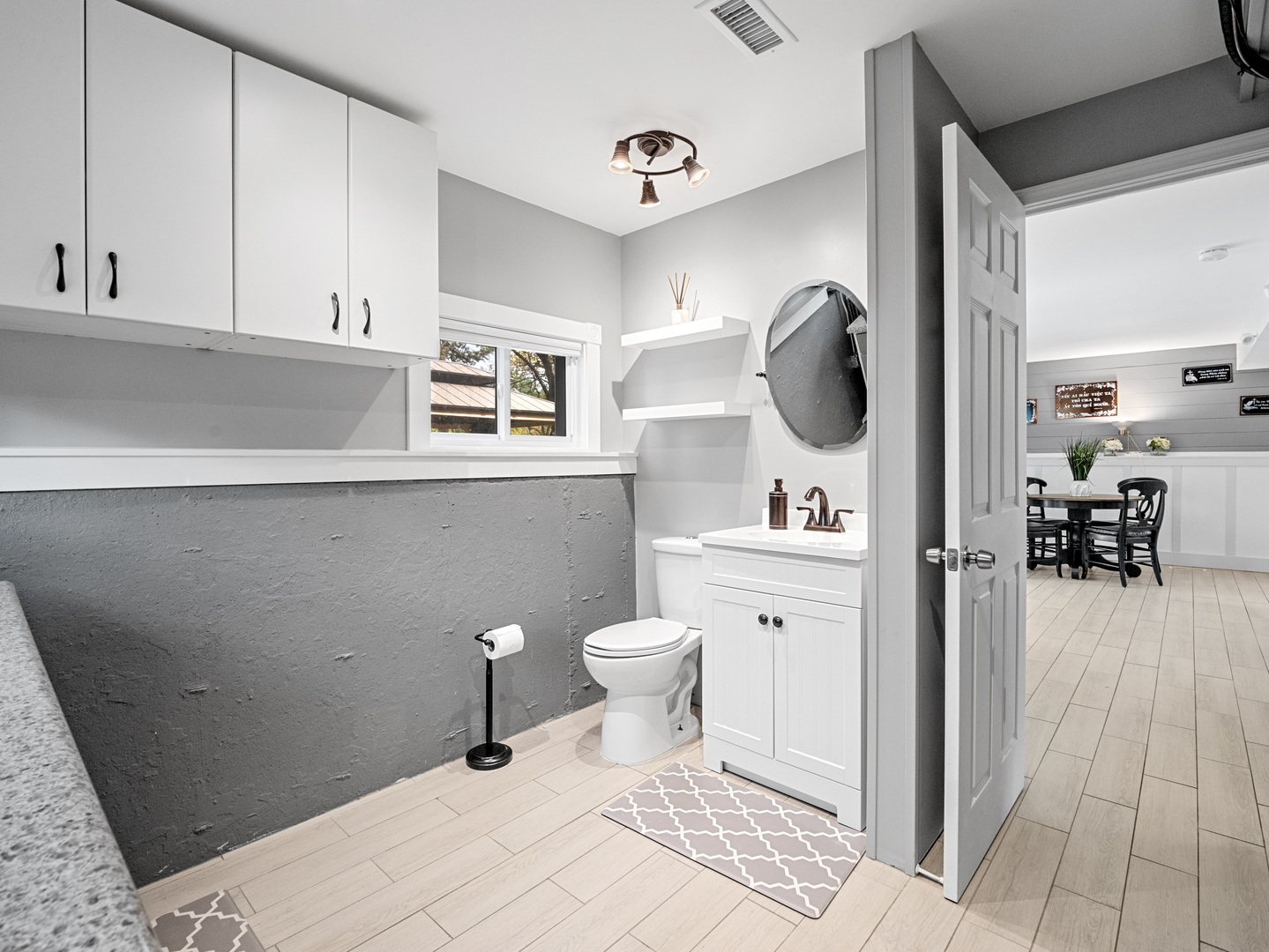 111 Timber Trail Streamwood, IL 60107 - Photo 17 of 35 a bathroom with a sink a toilet and a mirror