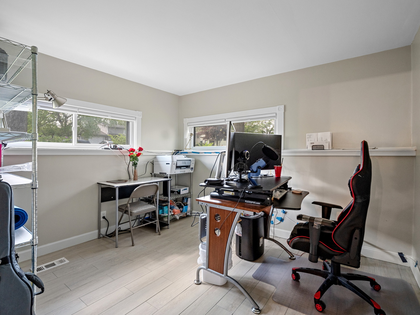 111 Timber Trail Streamwood, IL 60107 - Photo 19 of 35 a view of a workspace with furniture and a window