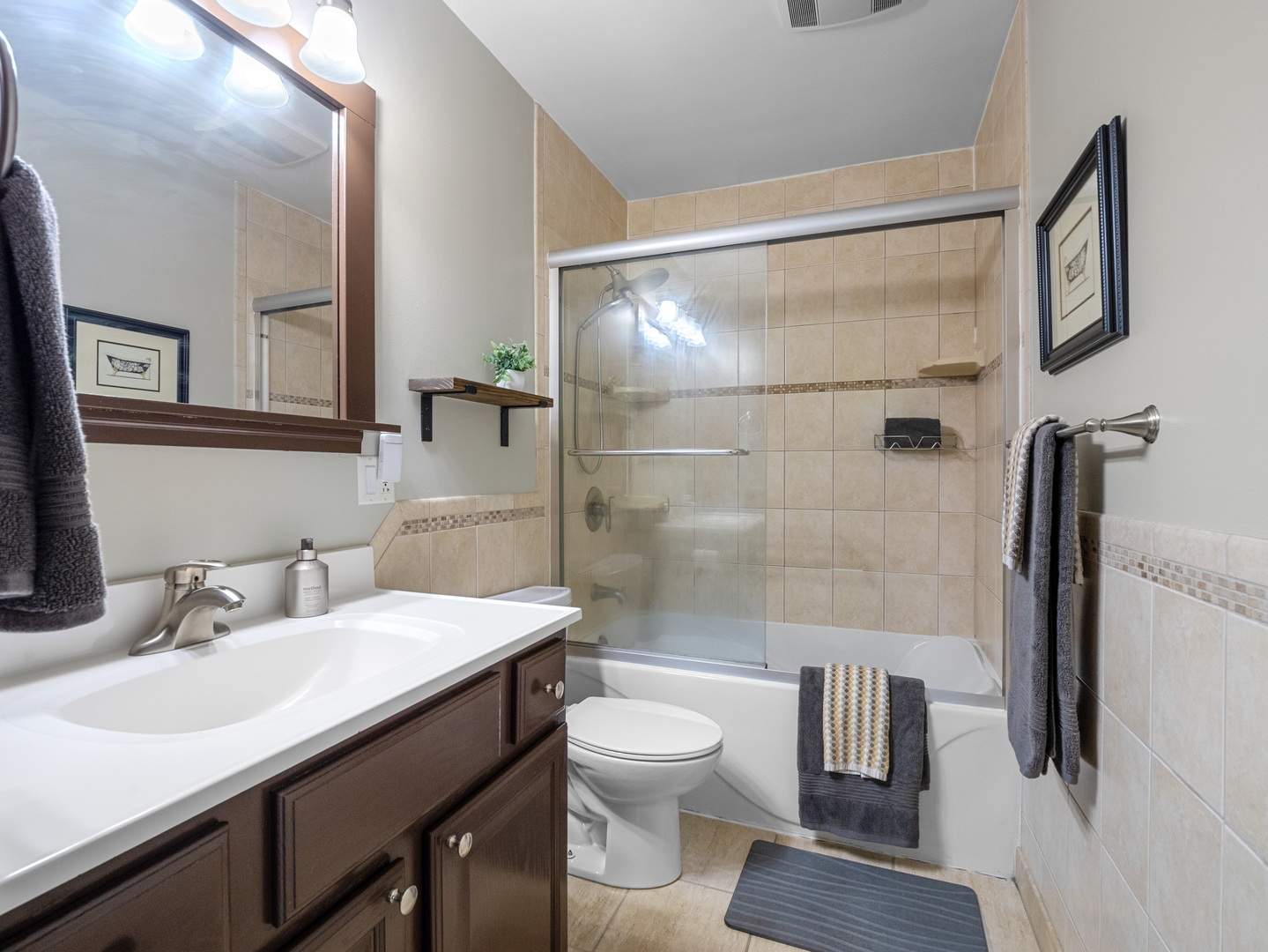 111 Timber Trail Streamwood, IL 60107 - Photo 25 of 35 a bathroom with a sink toilet and shower