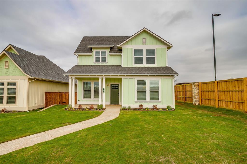 100 Cardinal Wds Granbury, TX 76049 - Photo 1 of 32 a front view of a house with a yard