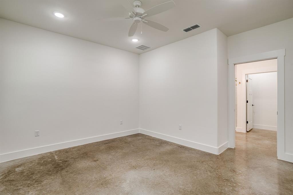 100 Cardinal Wds Granbury, TX 76049 - Photo 18 of 32 an empty room with a fan & a ceiling fan