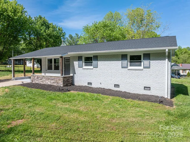 a house view with a garden space