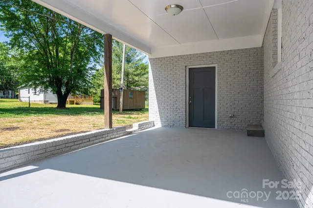 a view of a house with a porch