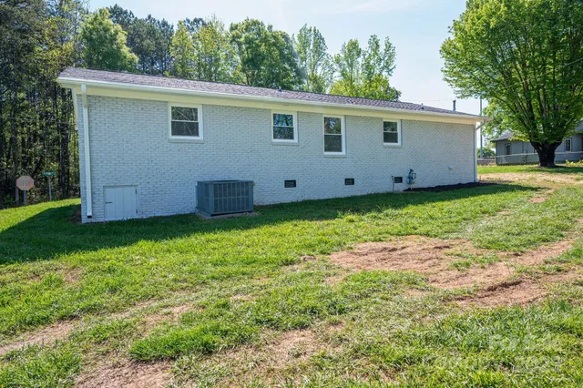 a view of a backyard with a garden