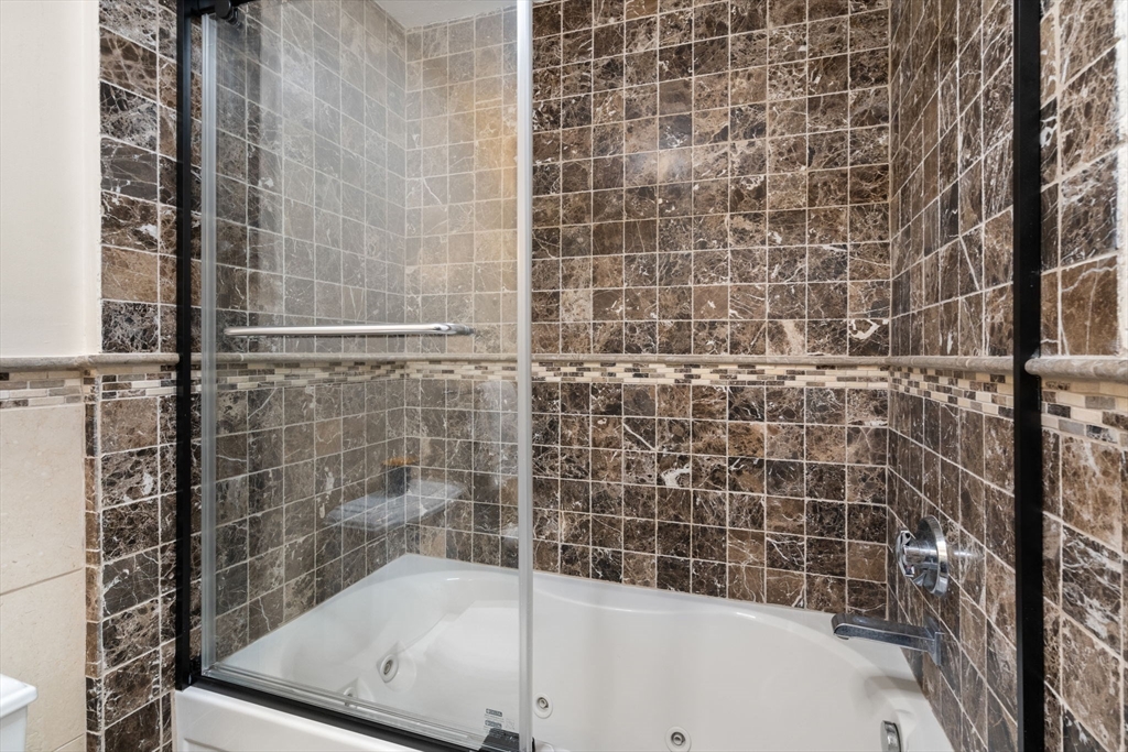 9 Mallard Drive Sharon, MA 02067 - Photo 12 of 32 a bathroom with a bathtub