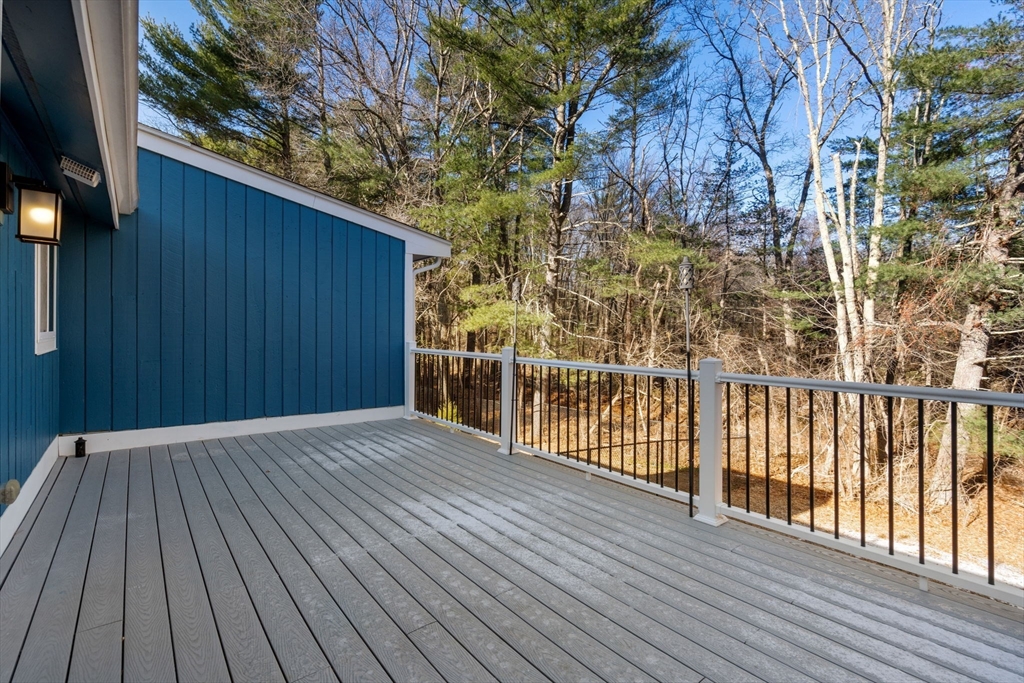 9 Mallard Drive Sharon, MA 02067 - Photo 19 of 32 a view of backyard with wooden floor and fence