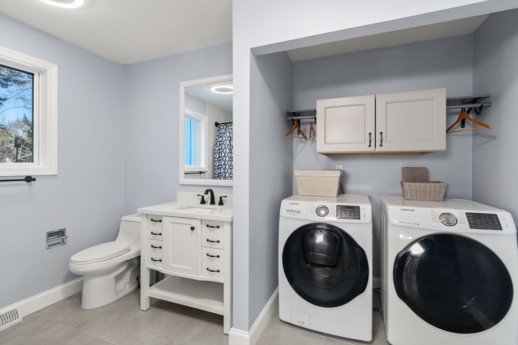 9 Mallard Drive Sharon, MA 02067 - Photo 24 of 32 a utility room with dryer and washer
