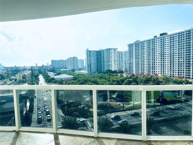 a view of a city with tall buildings