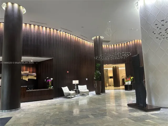 a view of a swimming pool with a table and chairs