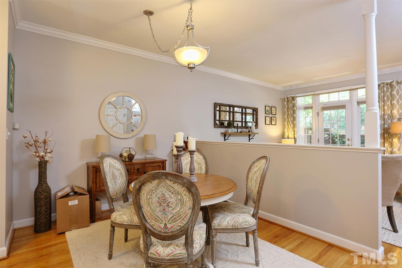 125 Fenner Lane Raleigh, NC 27603 - Photo 9 of 24 a very nice looking dining room with furniture window and wooden floor
