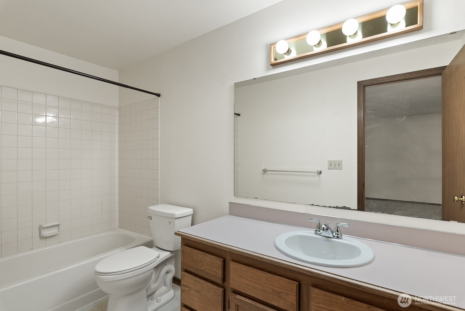 810 151st Street Southwest Lynnwood, WA 98087 - Photo 18 of 38 a bathroom with a sink a toilet and shower