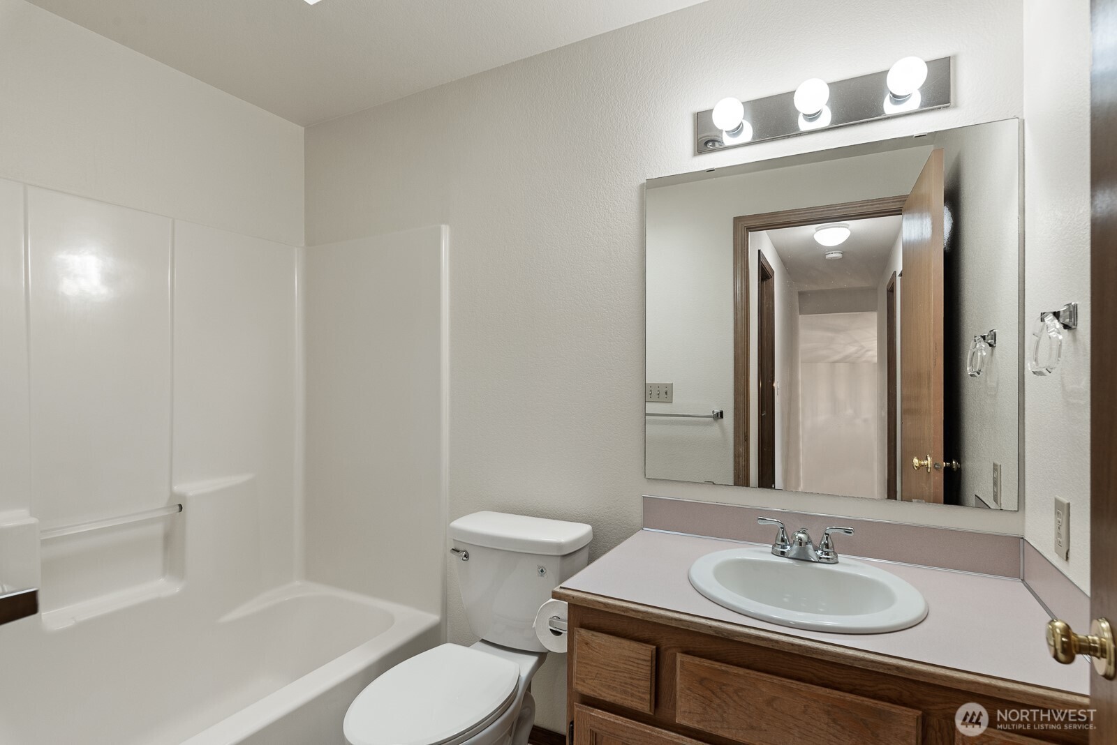 810 151st Street Southwest Lynnwood, WA 98087 - Photo 20 of 38 a bathroom with a sink toilet and mirror