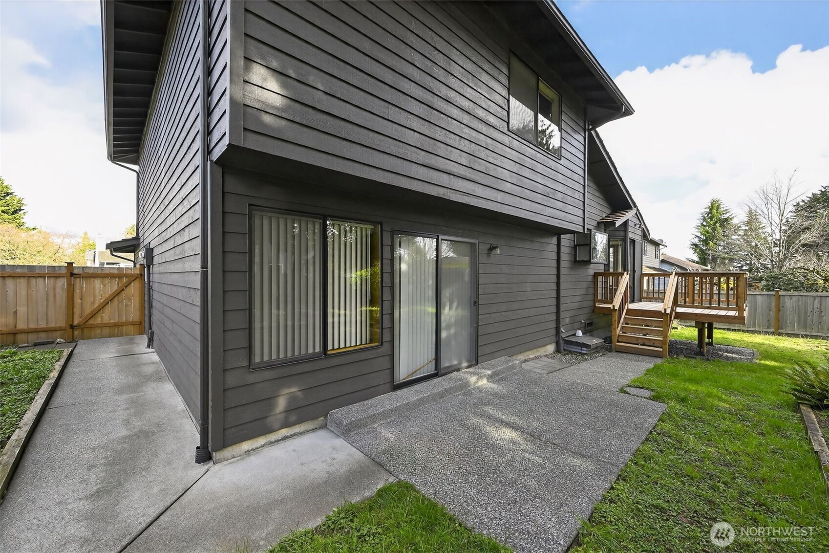 810 151st Street Southwest Lynnwood, WA 98087 - Photo 34 of 38 a view of a house with a yard and wooden fence