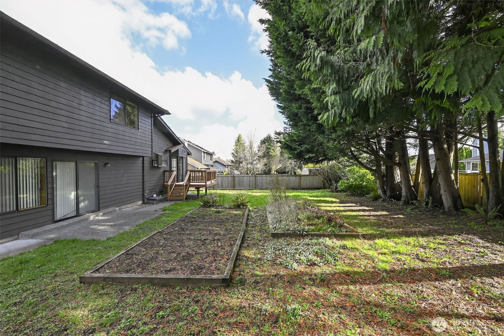 810 151st Street Southwest Lynnwood, WA 98087 - Photo 37 of 38 a view of a house with a yard