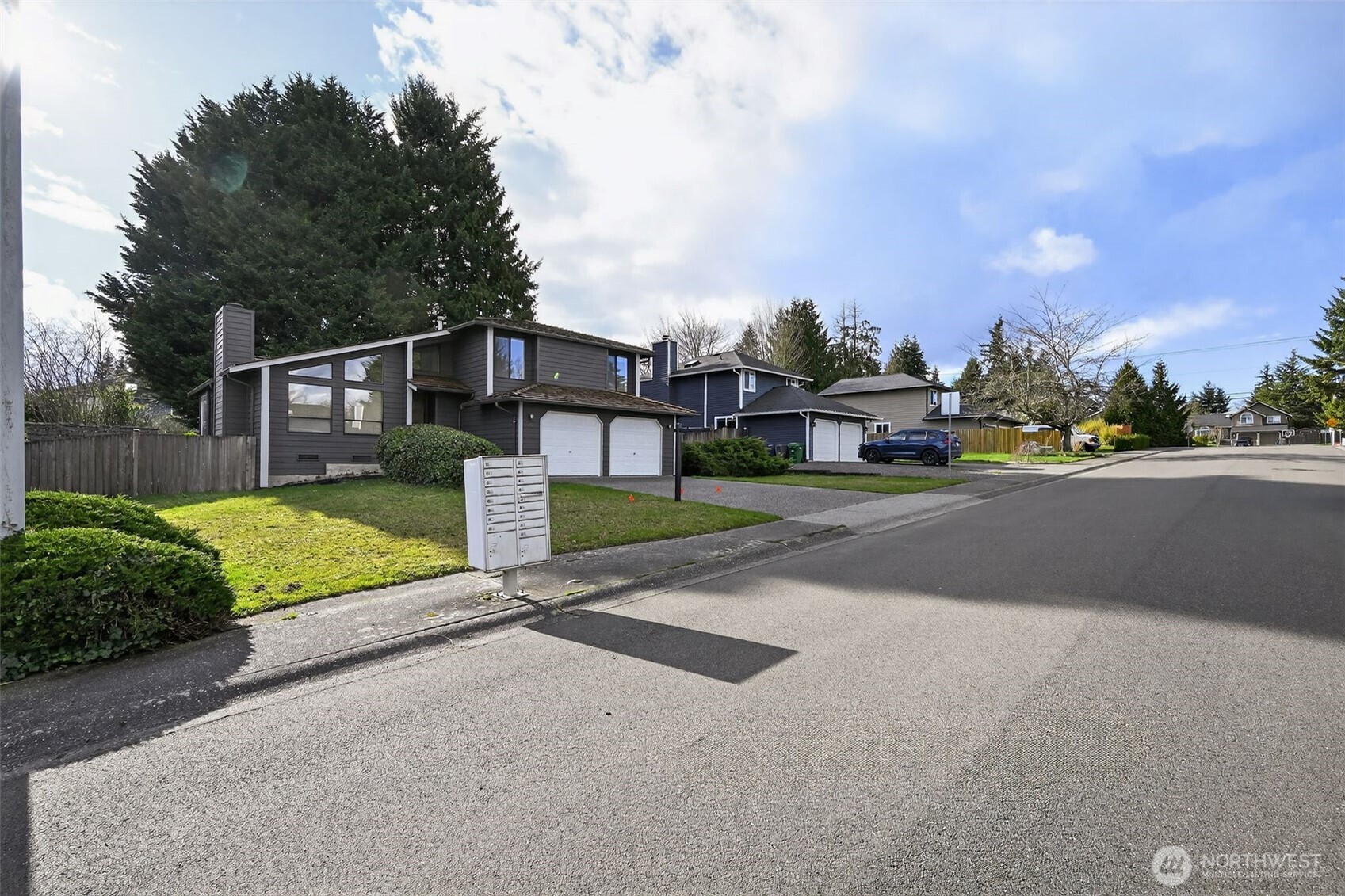 810 151st Street Southwest Lynnwood, WA 98087 - Photo 38 of 38 a view of street with flower on the side of it