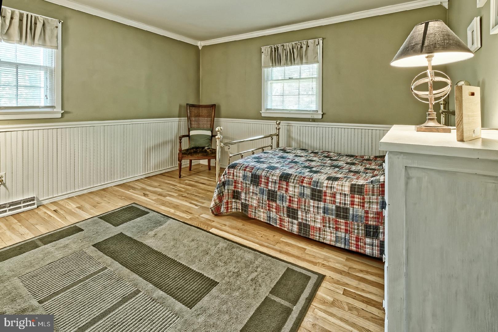 204 Ridge Road Southampton, NJ 08088 - Photo 23 of 36 a living room with a couch and a rug