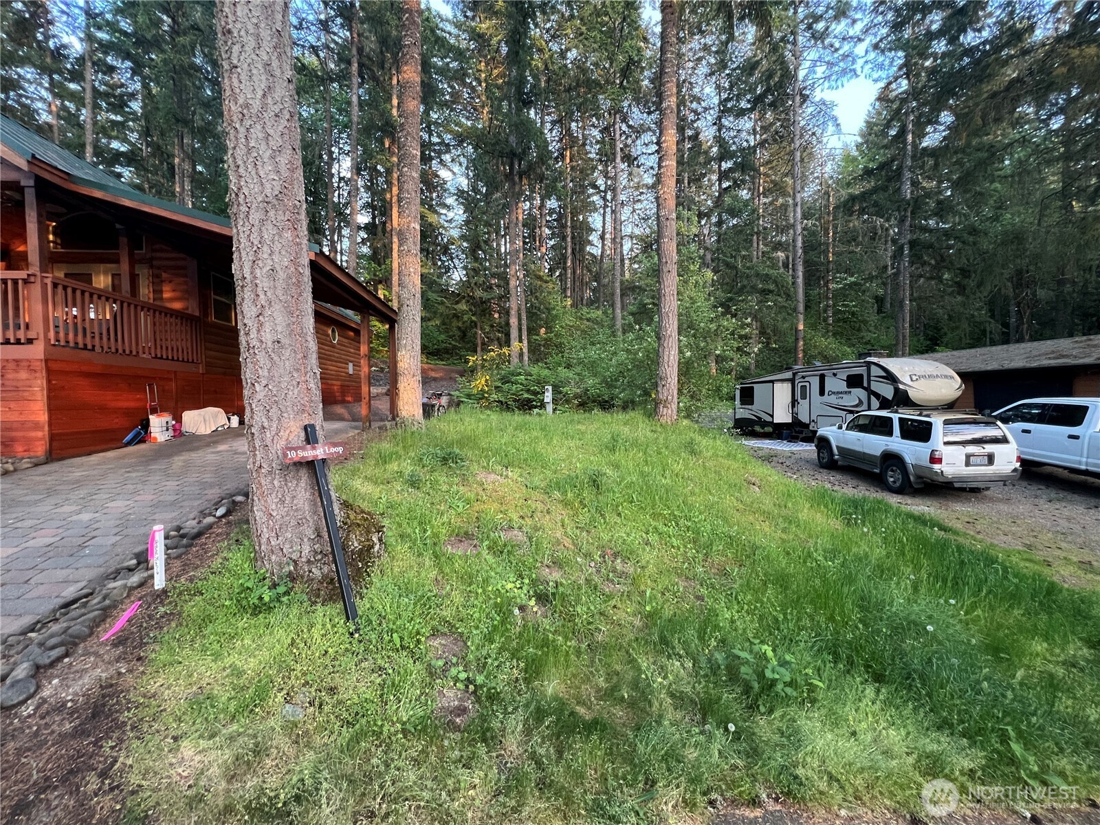 1546 Reservation Road Southeast, Unit 122 Olympia, WA 98513 - Photo 1 of 14 a view of a house with backyard