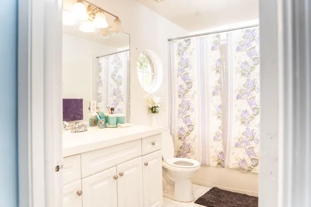 a room with furniture and a flat screen tv