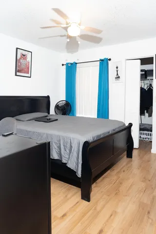 a bathroom with a toilet sink and vanity