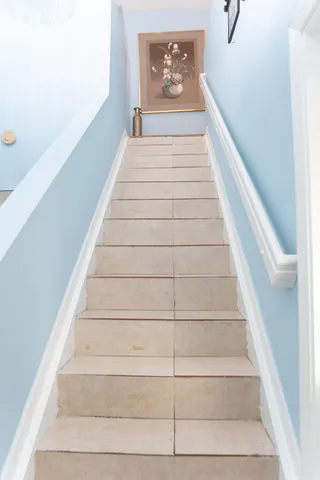 a kitchen with stainless steel appliances a stove a sink and a microwave