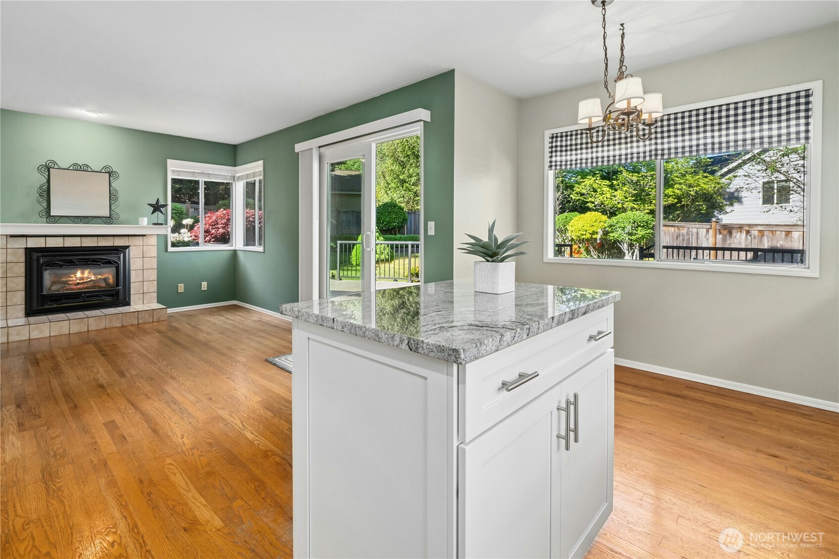 12818 Northeast 203rd Place Bothell, WA 98011 - Photo 11 of 36 a kitchen with a sink and a fireplace