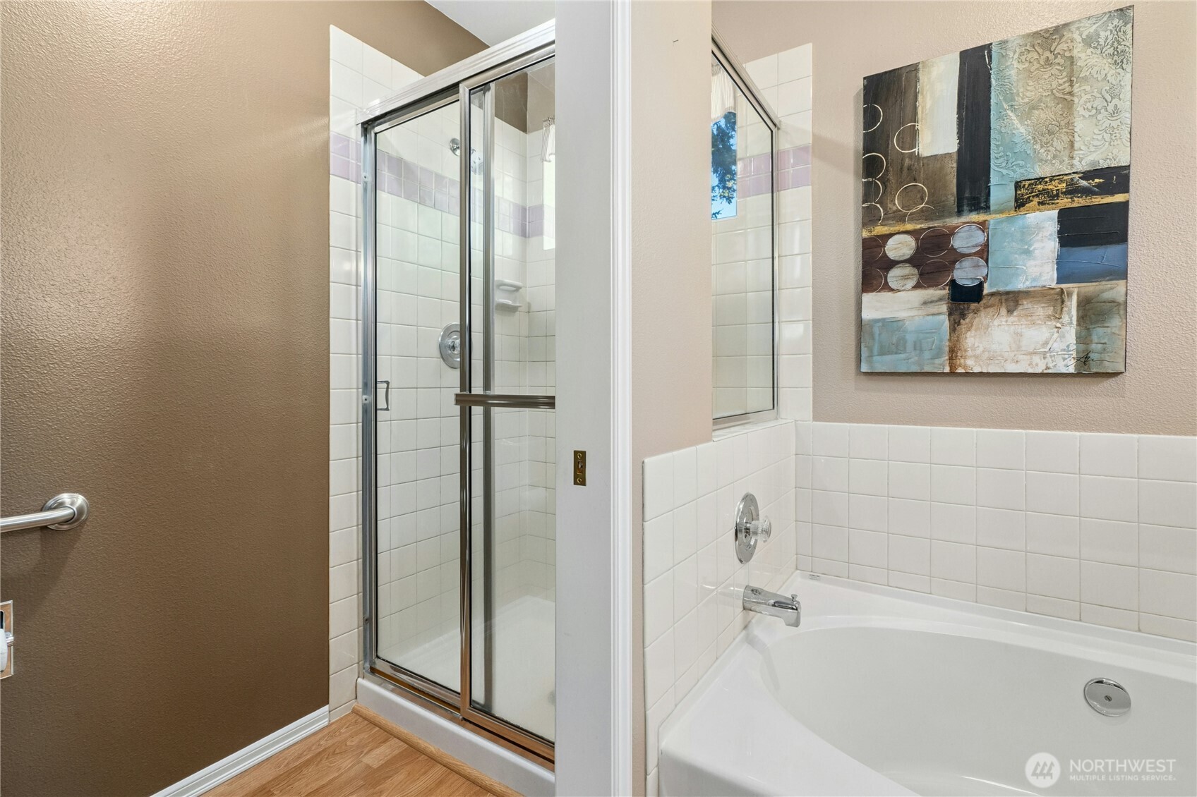 12818 Northeast 203rd Place Bothell, WA 98011 - Photo 17 of 36 a bathroom with a bathtub and a shower