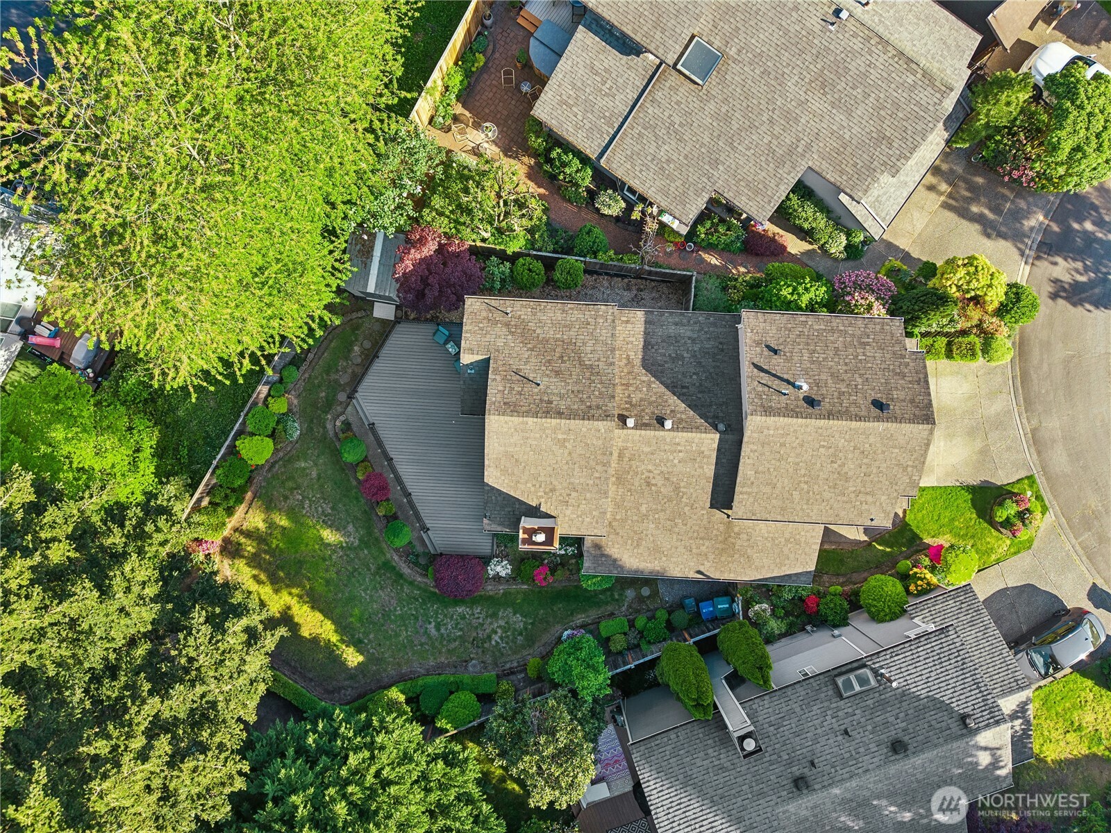 12818 Northeast 203rd Place Bothell, WA 98011 - Photo 29 of 36 an aerial view of a house with a yard