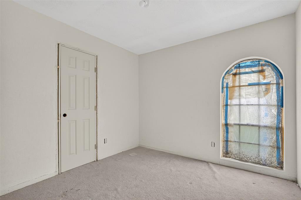 1212 Manning Road Benbrook, TX 76126 - Photo 12 of 20 Arched window feature with grid panes