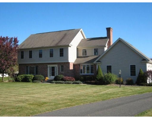 5 Ridge Road Hampden, MA 01036 - Photo 3 of 27 a front view of a house with a garden