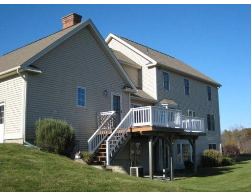 5 Ridge Road Hampden, MA 01036 - Photo 5 of 27 a front view of a house with a yard