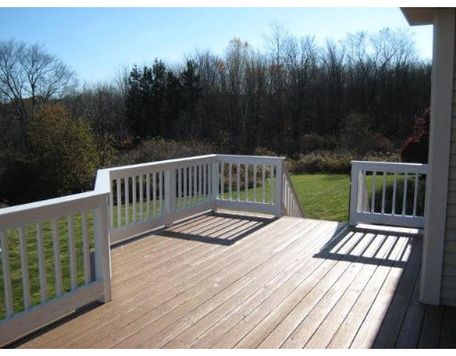 5 Ridge Road Hampden, MA 01036 - Photo 8 of 27 a view of balcony with wooden floor and fence