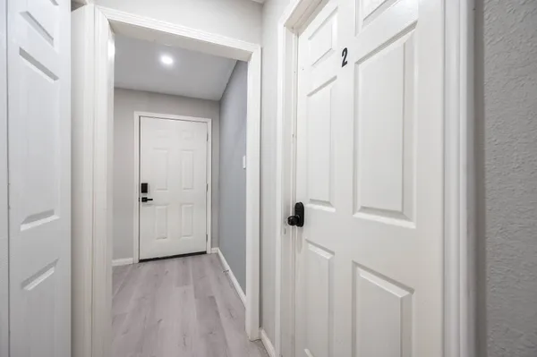a view of a bathroom with a sink and a mirror