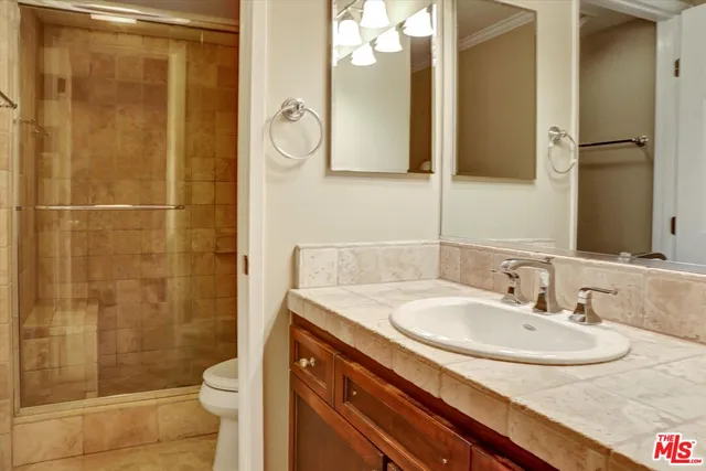 a bathroom with a shower and a bathtub