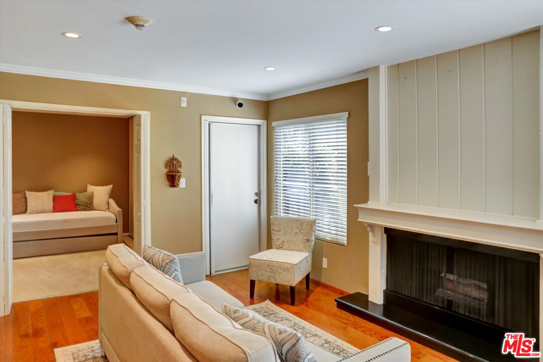 4845 Maytime Lane Culver City, CA 90230 - Photo 2 of 20 a living room with furniture and a fireplace