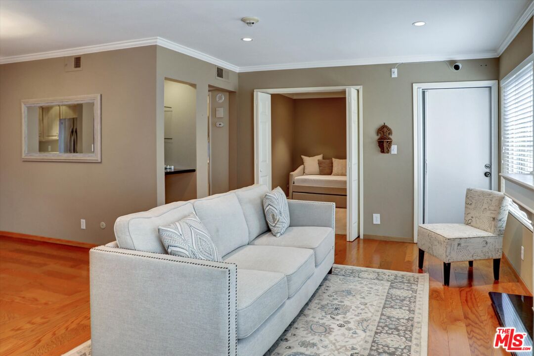 4845 Maytime Lane Culver City, CA 90230 - Photo 6 of 20 a living room with furniture and a dining table