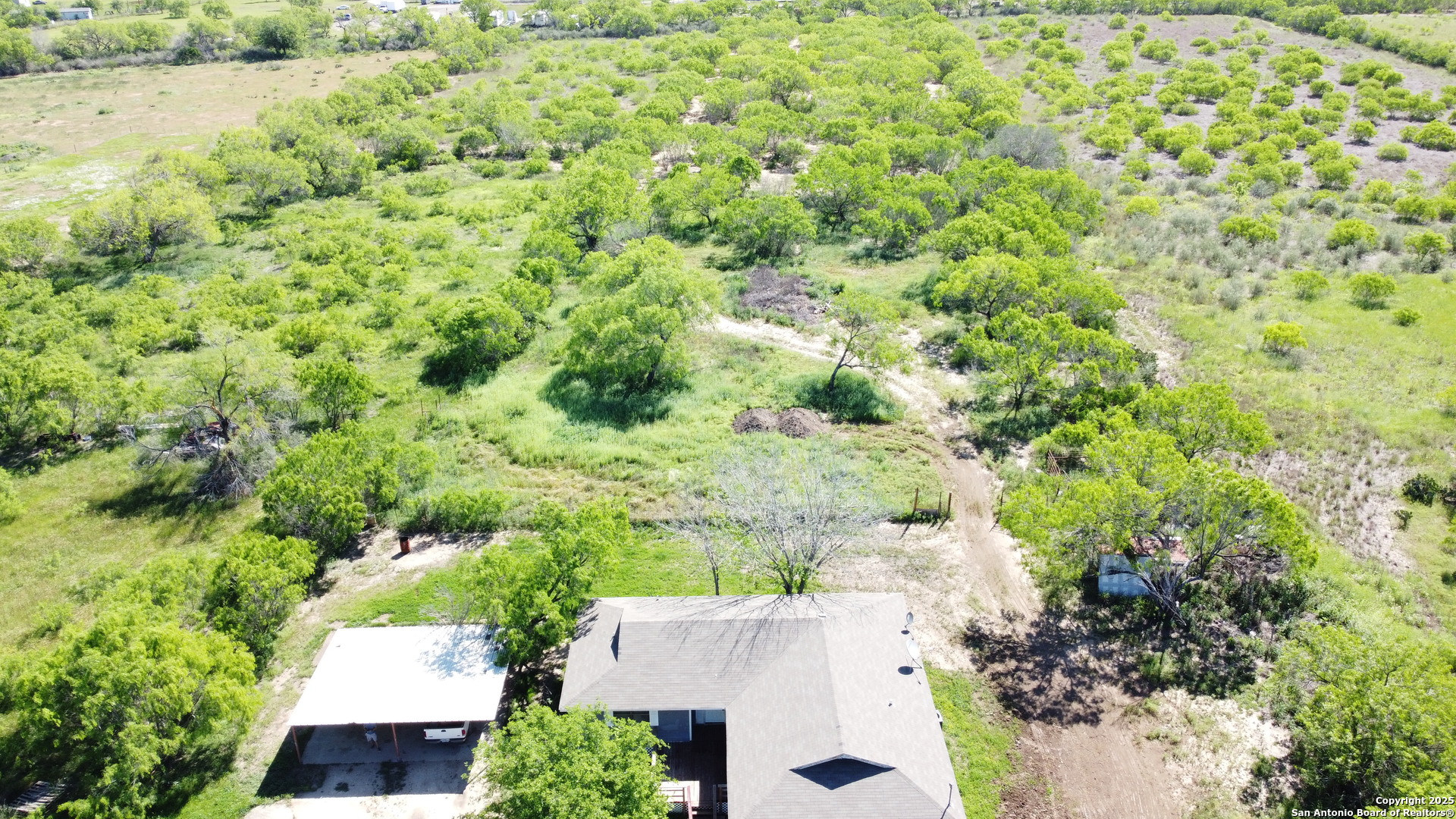 18234 Benton City Road Von Ormy, TX 78073 - Photo 25 of 25 an aerial view of residential house with outdoor space