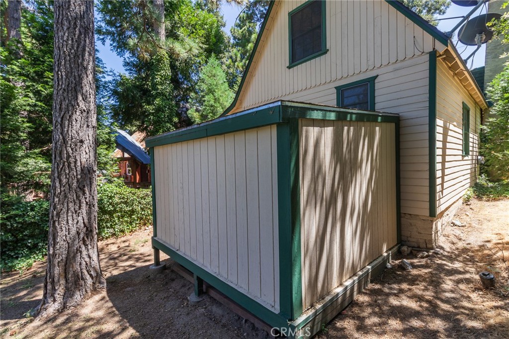 26370 Alpine Lane Twin Peaks, CA 92391 - Photo 12 of 37 a view of a house with backyard and garden